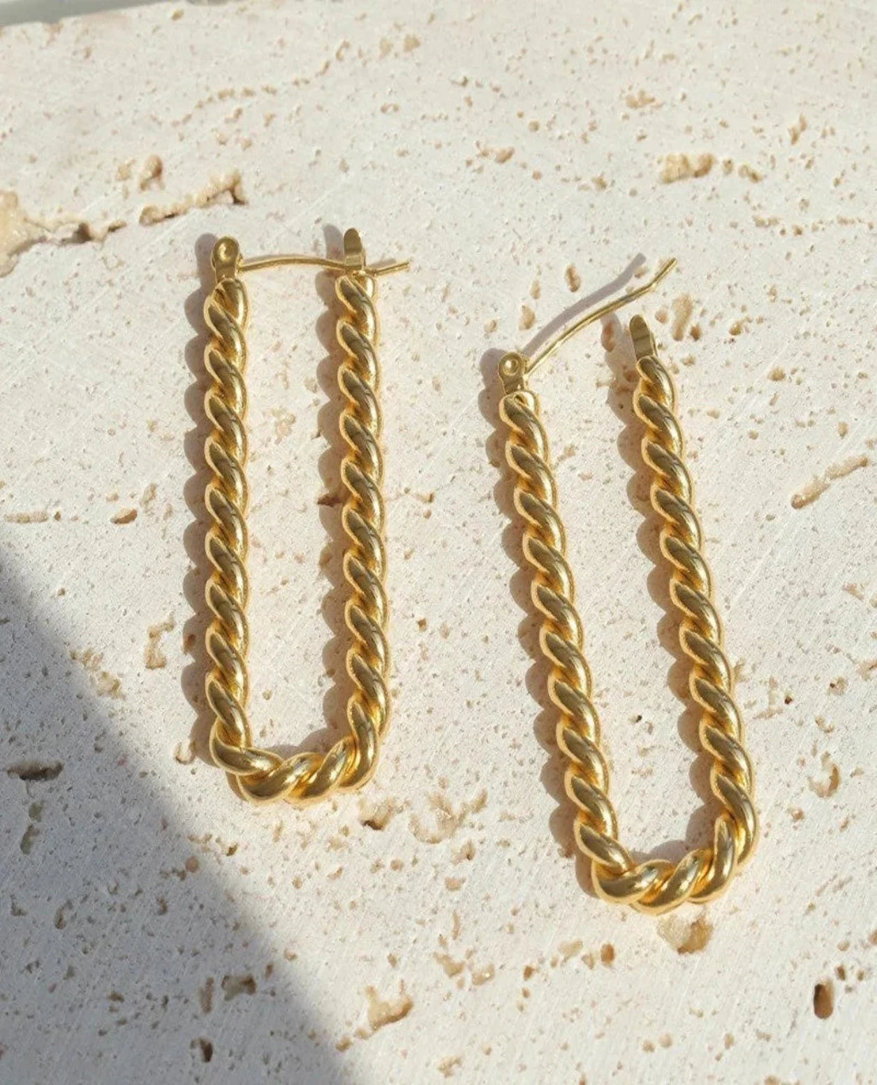 Rectangular hoops with twisted statement earring