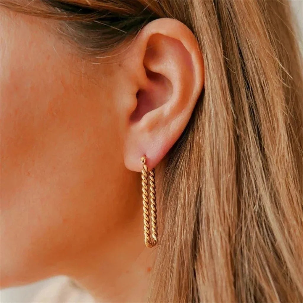 Rectangular hoops with twisted statement earring